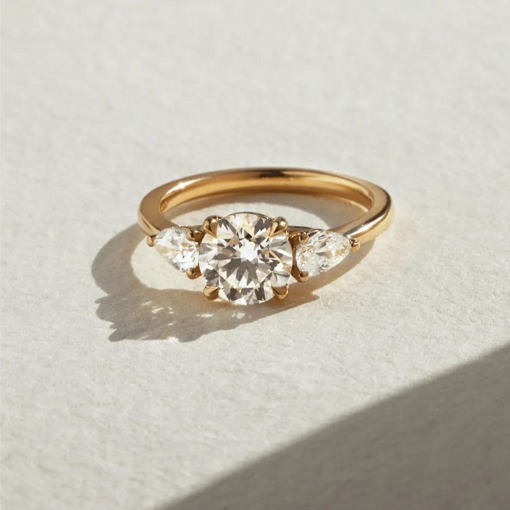 Celeste 1.50 Carat Round Lab-Grown Diamond Three-Stone Engagement Ring in Yellow Gold