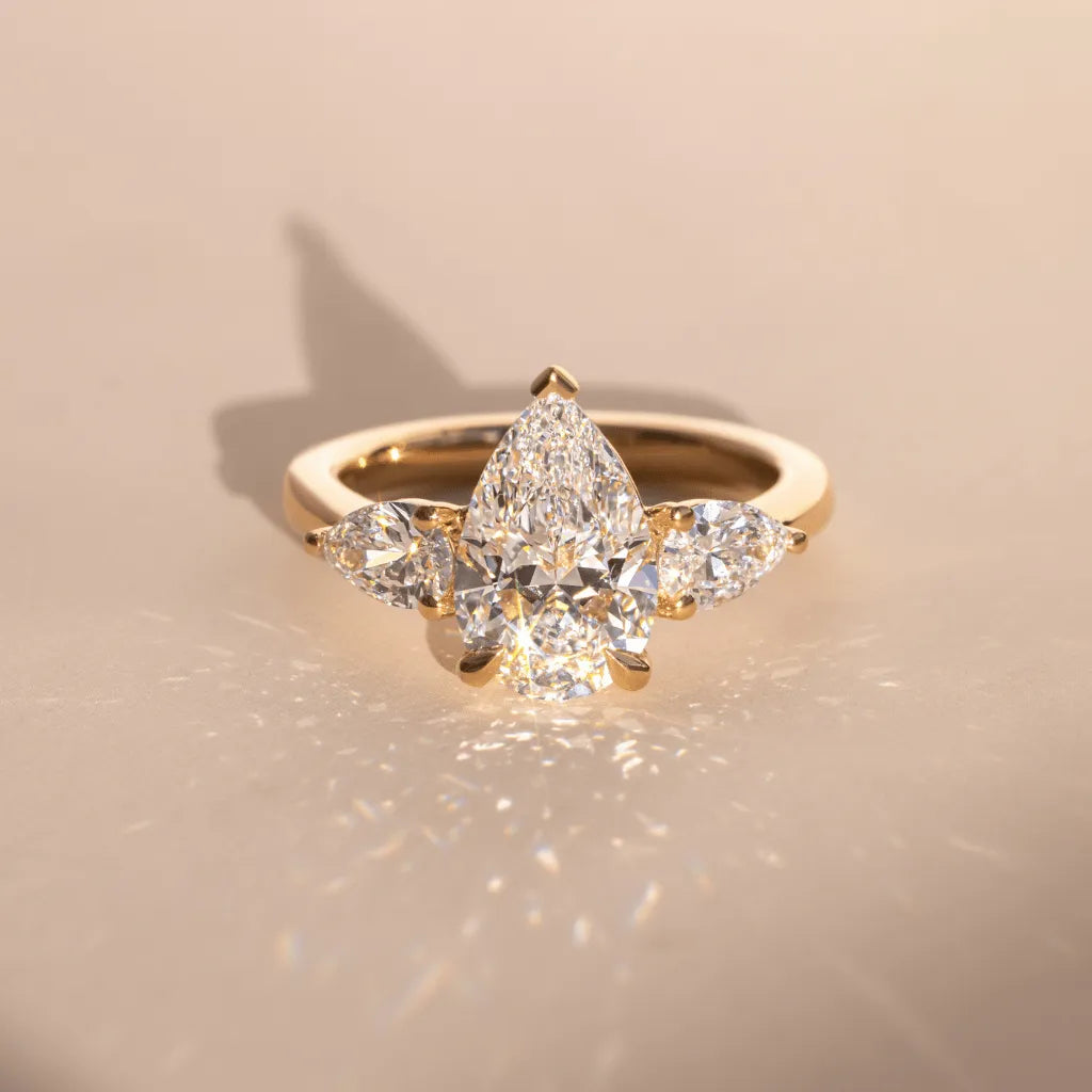 Elara 2 Carat Lab-Grown Pear Diamond Three-Stone Engagement Ring in Yellow Gold