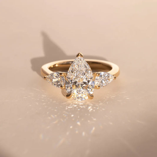 Elara 2 Carat Lab-Grown Pear Diamond Three-Stone Engagement Ring in Yellow Gold