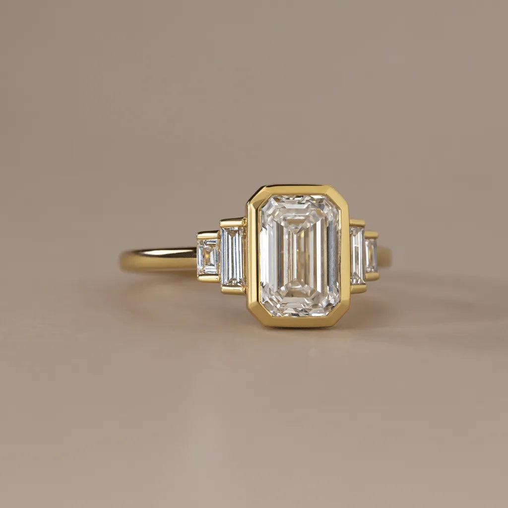 3 Carat Lab-Grown Emerald-Cut Diamond Bezel-Set Engagement Ring in Yellow Gold – Calista