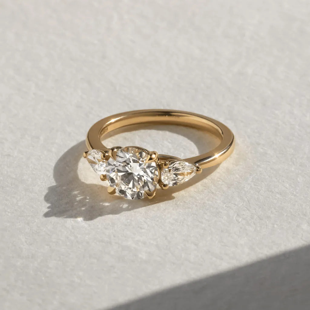 Celeste 1.50 Carat Round Lab-Grown Diamond Three-Stone Engagement Ring in Yellow Gold