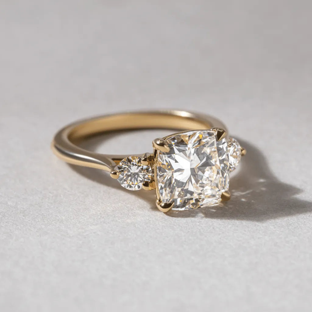 2 Carat Lab-Grown Cushion Diamond Three-Stone Ring with Yellow Gold Setting – Isolde