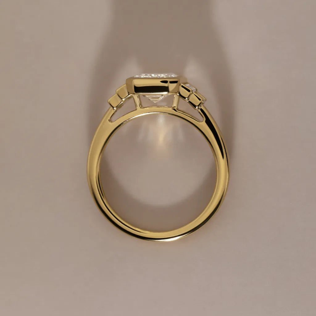 3 Carat Lab-Grown Emerald-Cut Diamond Bezel-Set Engagement Ring in Yellow Gold – Calista