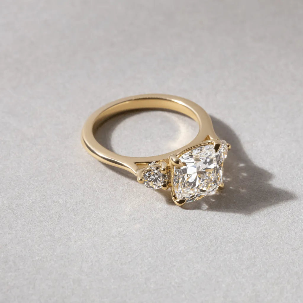 2 Carat Lab-Grown Cushion Diamond Three-Stone Ring with Yellow Gold Setting – Isolde
